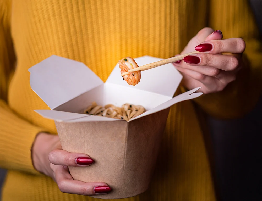 Food grade paperboard kraft grease resistant corrugated food boxes UAE maintaining freshness safe handling cake meal packaging